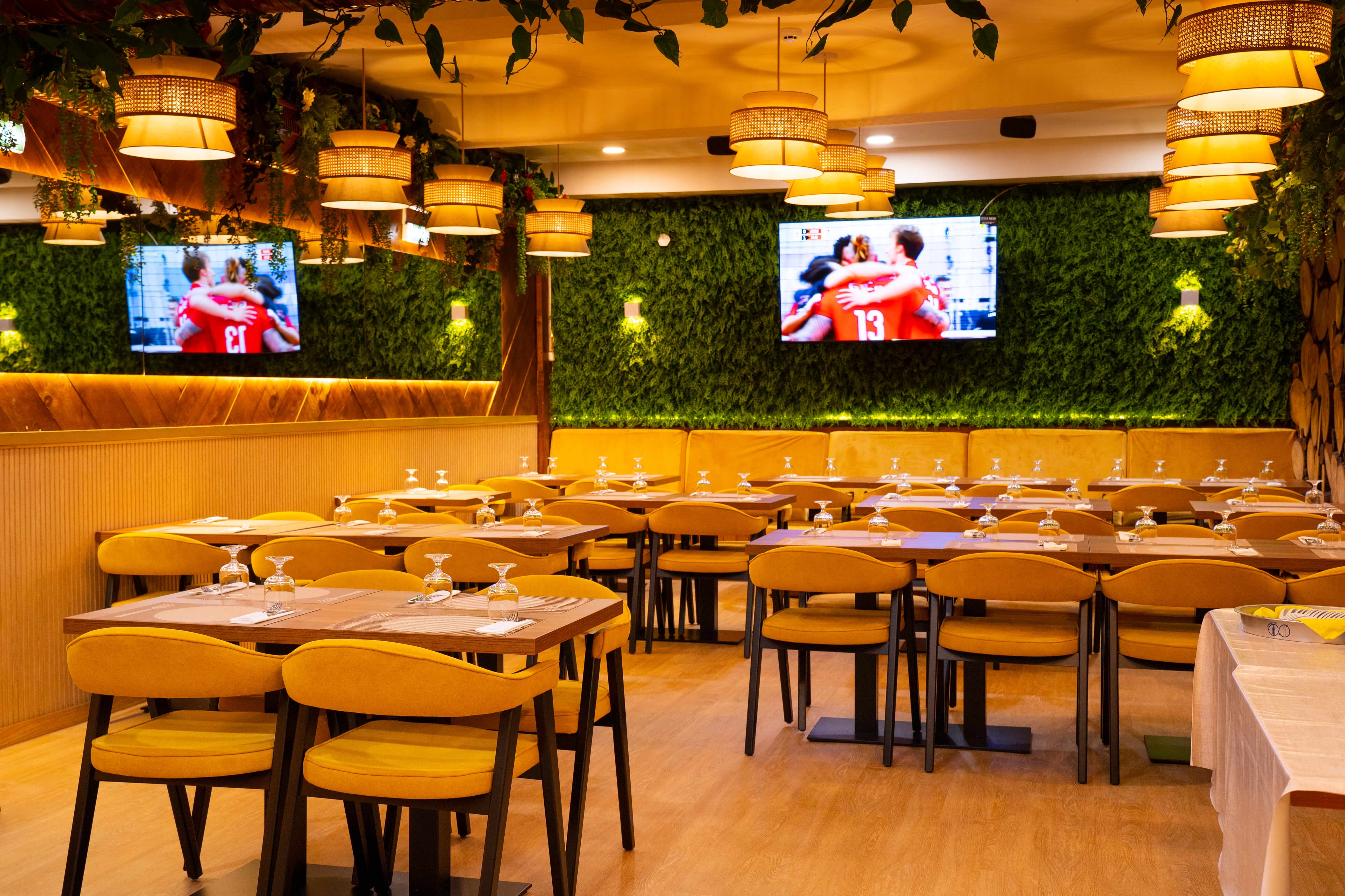 Main dining room with living plant wall